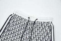 Black and white patterned beach shorts