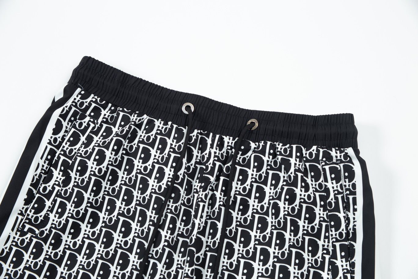 Black and white patterned beach shorts