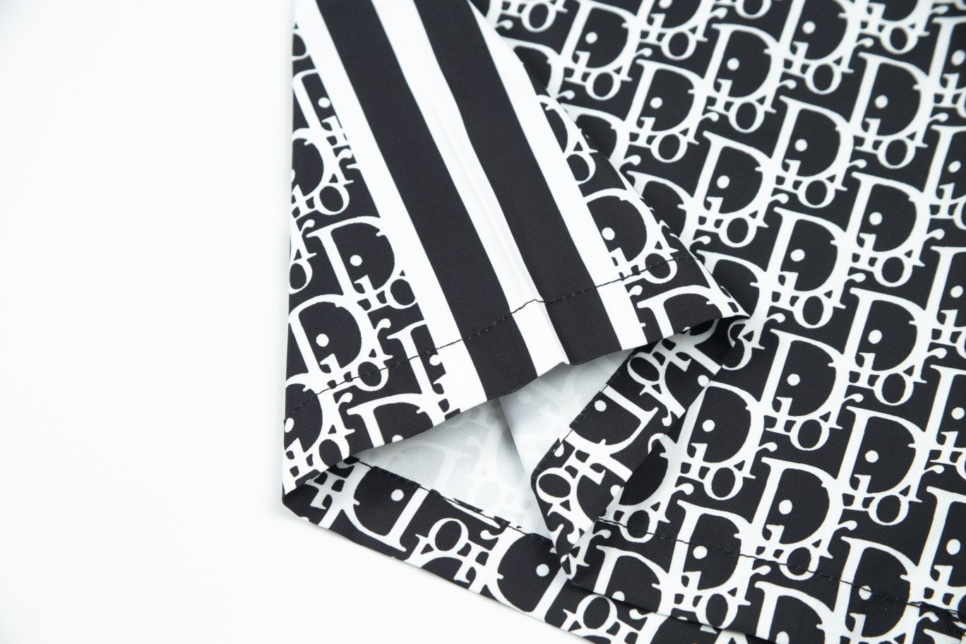 Black and white patterned beach shorts