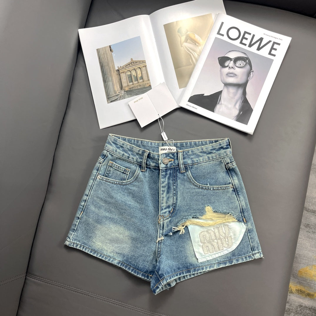 Denim-Shorts mit Strass-Taschen-Design