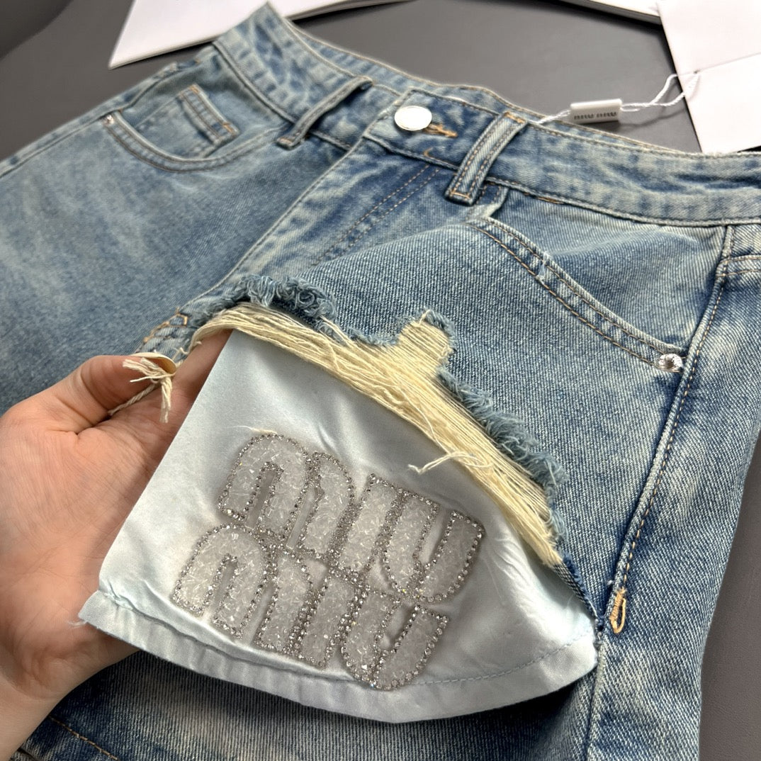 Denim-Shorts mit Strass-Taschen-Design