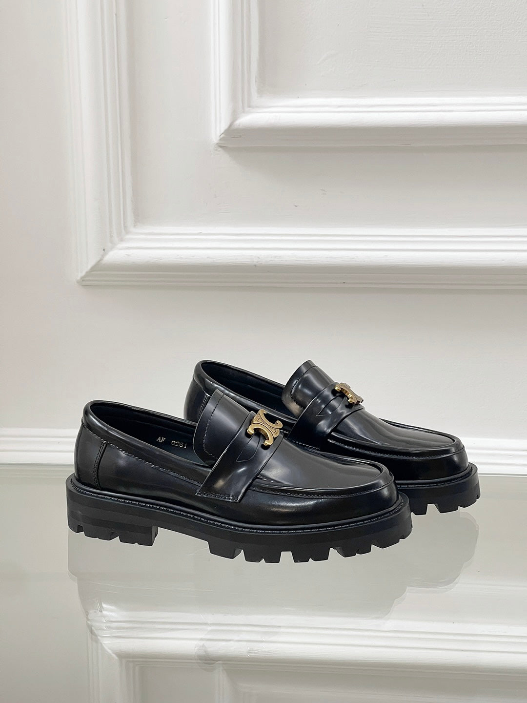 Thick-soled Arc de Triomphe loafers