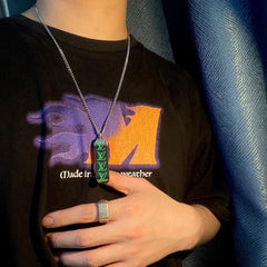 Skateboard style metal pendant necklace