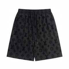 All-over printed dark logo pattern shorts