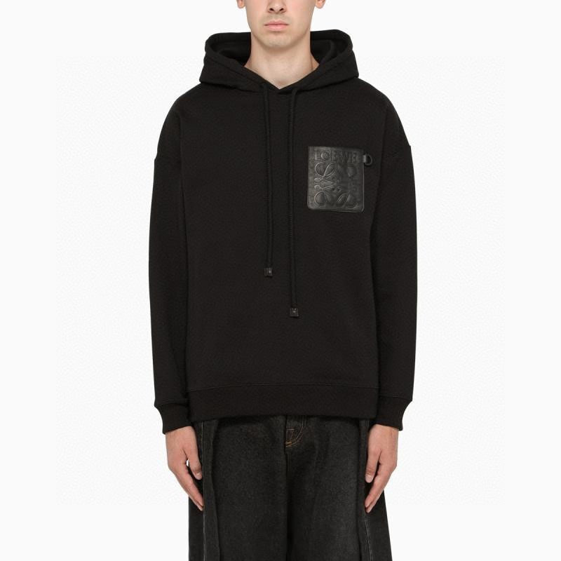 Hooded sweatshirt with embossed leather patch on chest